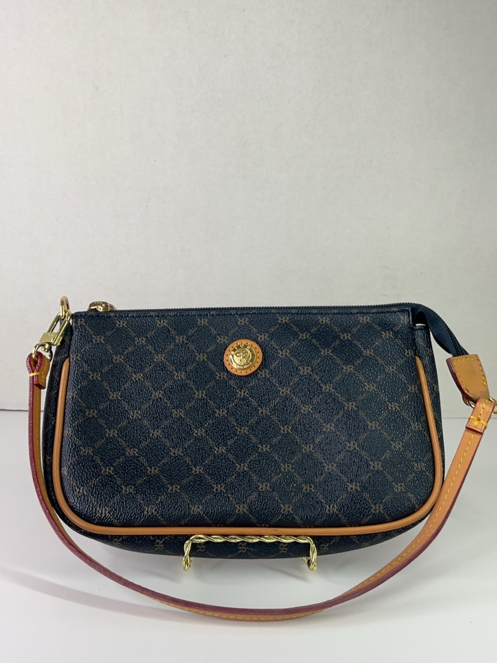 Rioni Signature Navy Blue shoulder handbag.